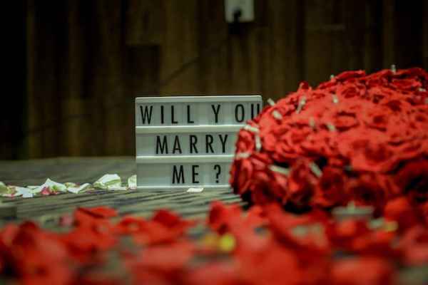 When His Eyes Opened Story Will You Marry Me Signage Roses