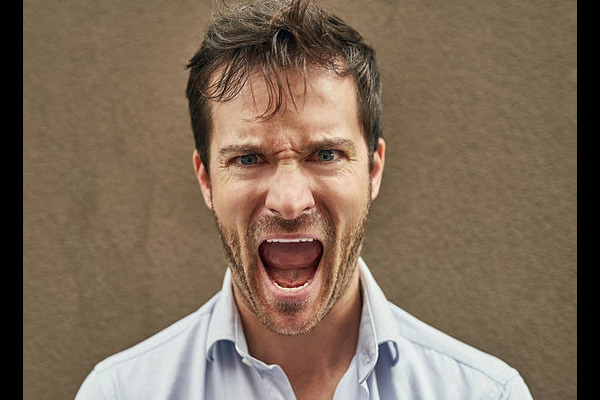 He's about to bite someone's head off stock photo